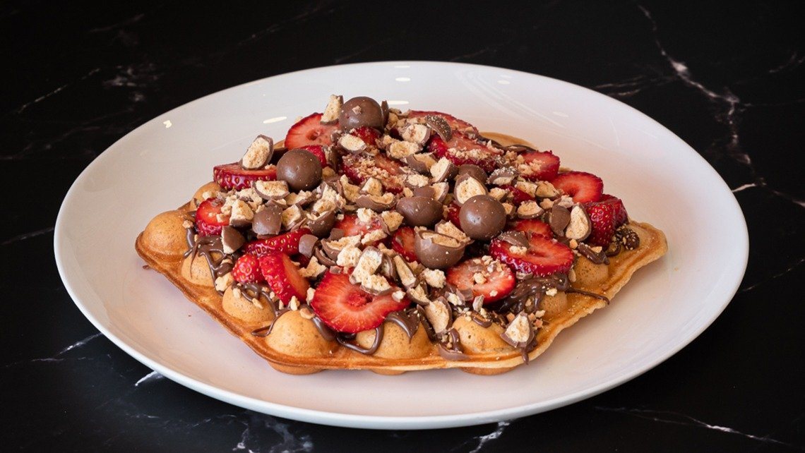 Sokolasi waffle with Nutella, strawberry and maltesers